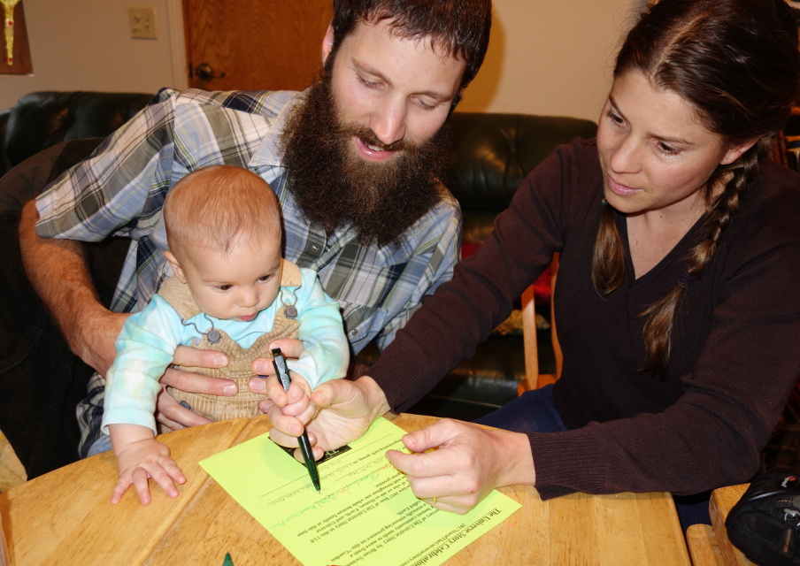 Jedediah signs the Declaration for 2017: Year of Our Universe Story